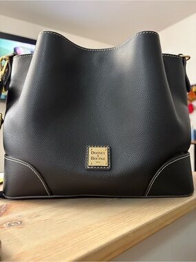 Dooney & Bourke Black Pebble Leather Shoulder Hobo with Gold Plaque